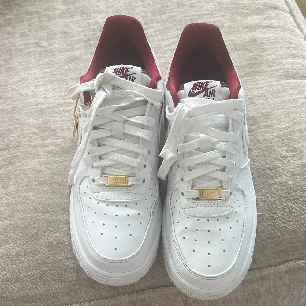 Nike Air Force One Women's Summit White Team Red-Metallic gold Sneakers.
